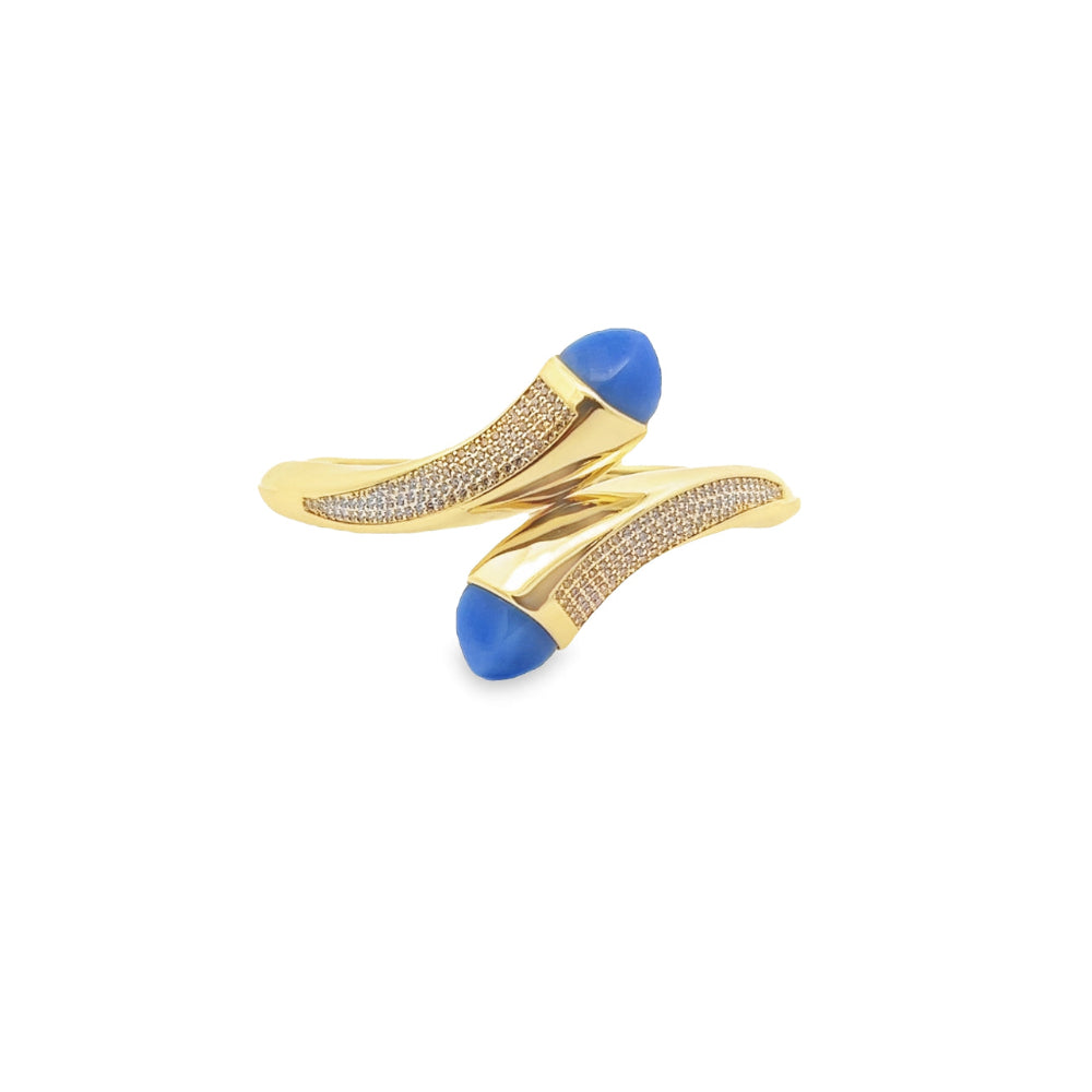 Elegant yellow gold plated wrap cuff bracelet with blue chalcedony crystals and pavé cubic zirconia accents. A luxe statement piece for every occasion. Shop premium jewelry online.