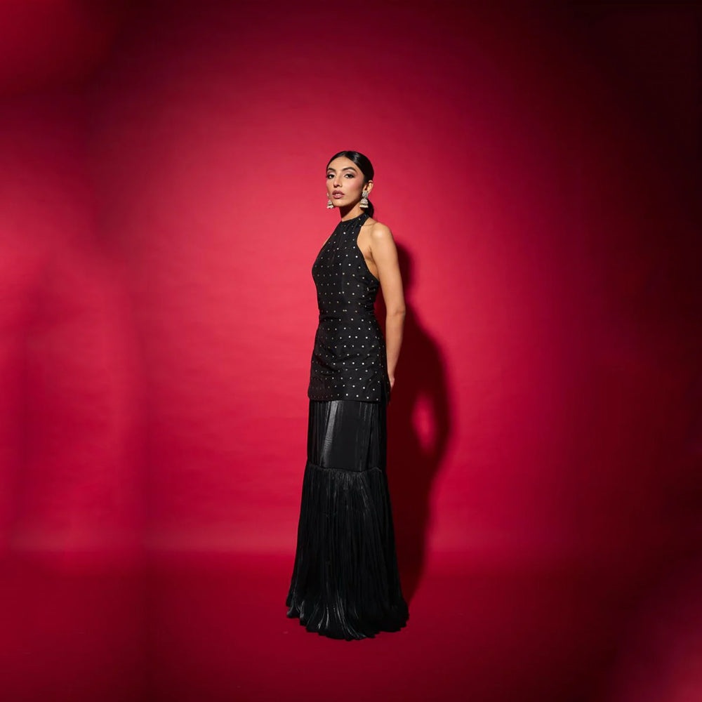 Brocade top with ruched satin skirt and brooch detail, perfect for festive wear. Shop online from our curated edit of premium fashion.