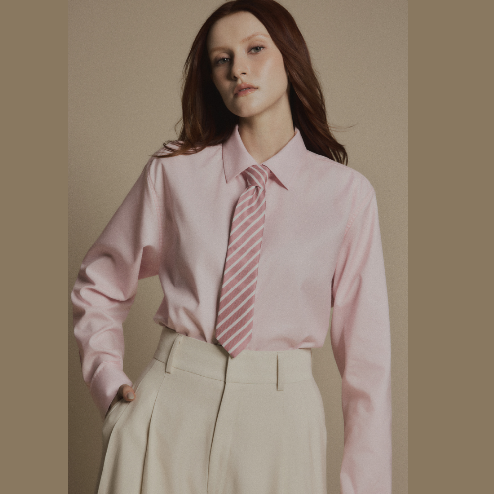 Experience modern luxury clothing paired seamlessly with sophisticated Ivory Drift Pants. Shop Now!