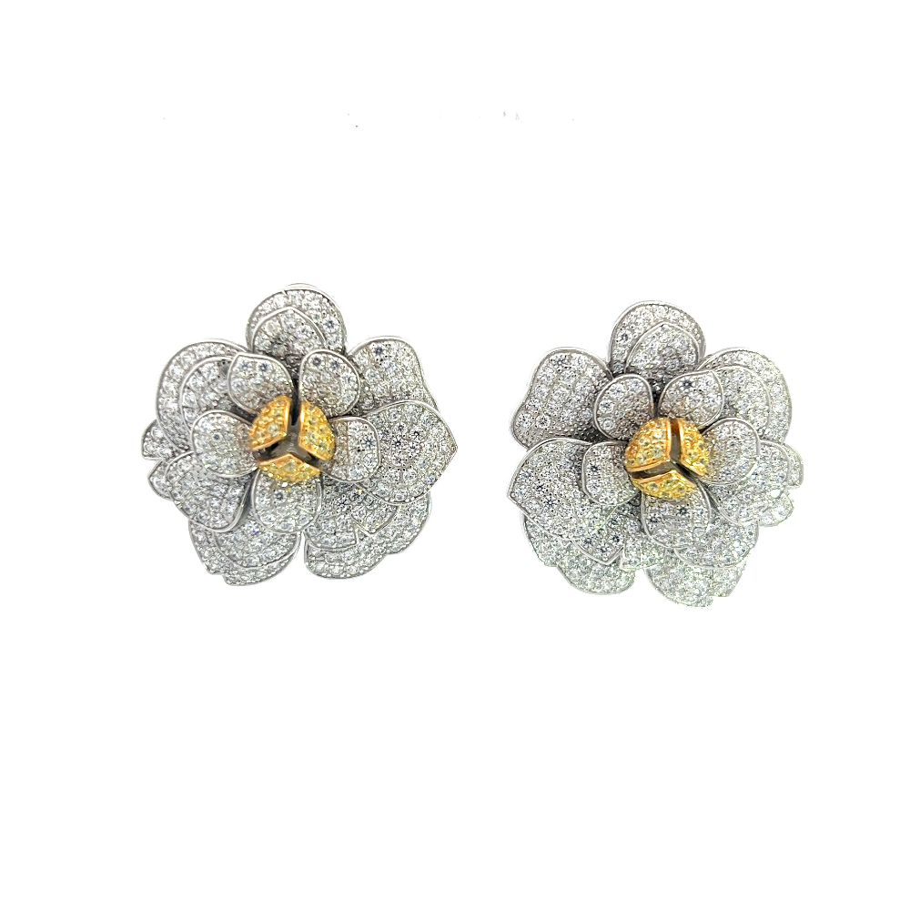 Shop online premium sterling silver statement earrings with sparkling cubic zirconia and elegant gold center detailing.