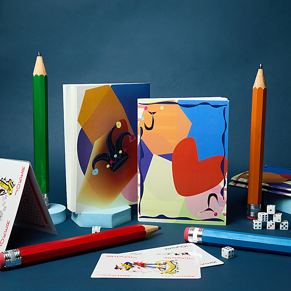 Discover the Joker Notebook at The Luxe Maison, featuring a vibrant, playful design, translucent vellum cover, and premium writing pages. Made in Dubai.
