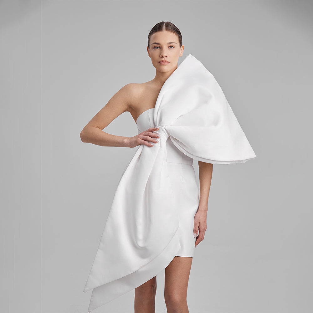 Shop our white mini dress crafted from Mikado with strapless corset and removable a huge bow. Explore our range of mini dresses for women. Shop now!