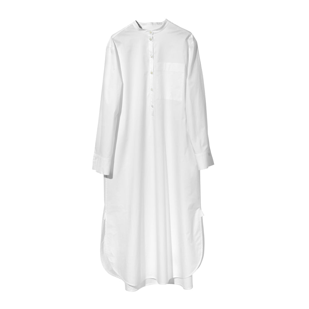 Discover the Kurta Caftan at The Luxe Maison, featuring an oversized silhouette, stand-up collar, statement pockets, and wide cuffs with mother-of-pearl cufflinks.