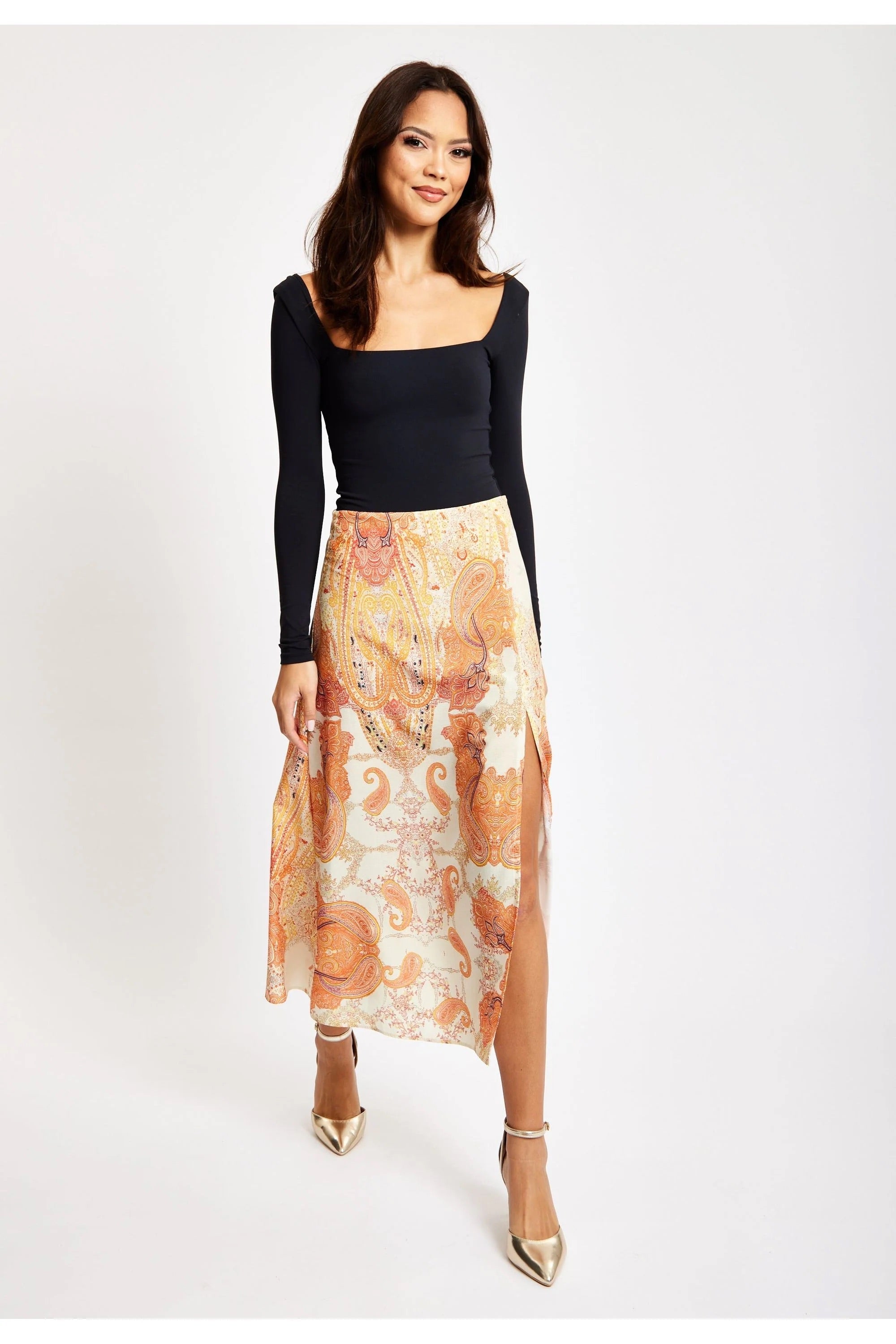 Women's Orange Abstract Print Midi Skirt with Front Slit for Holidays - Liquorish