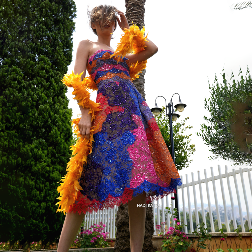 Patchwork embroidered lace short dress with feather shawl.