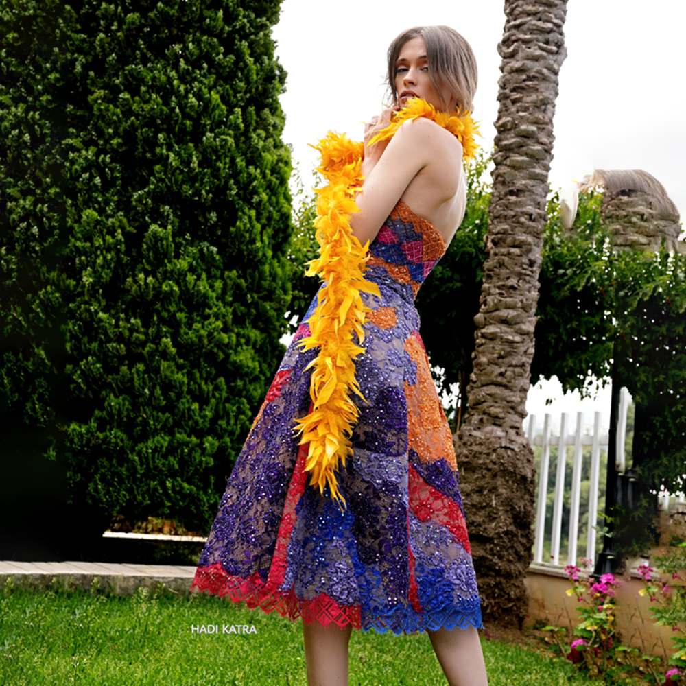 Patchwork embroidered lace short dress with feather shawl.