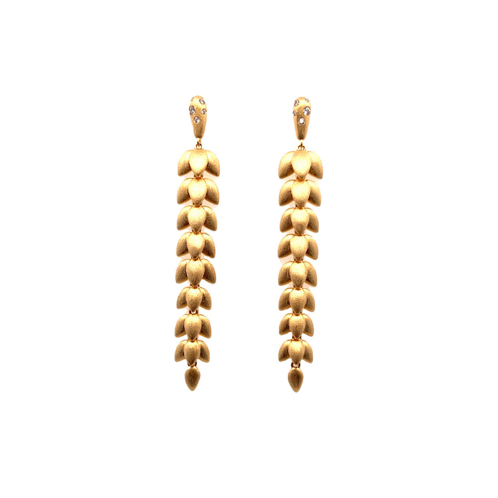 Shop online premium 18K gold leaf shoulder duster earrings with cubic zirconia stones.