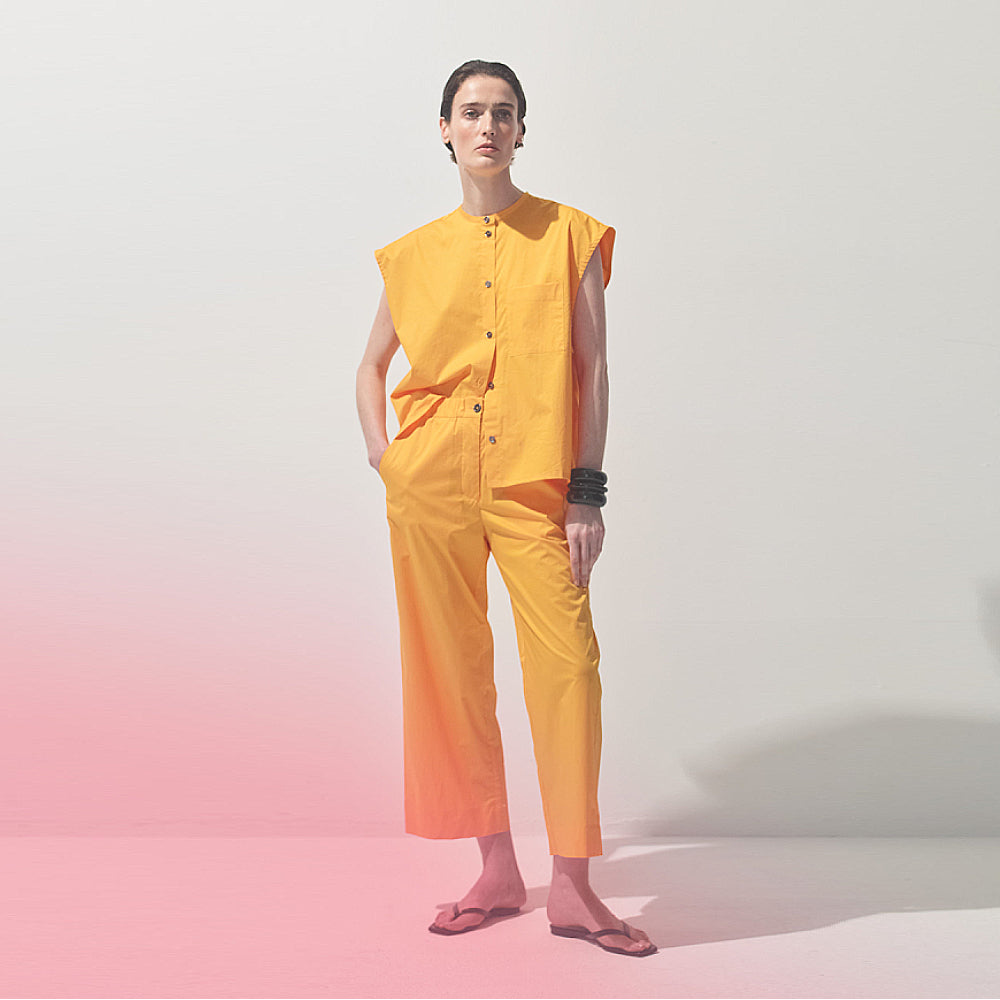 Discover the Lee Trousers at The Luxe Maison, featuring a relaxed pyjama-style fit, wide ankle-length legs, side pockets, and an elasticated waist.