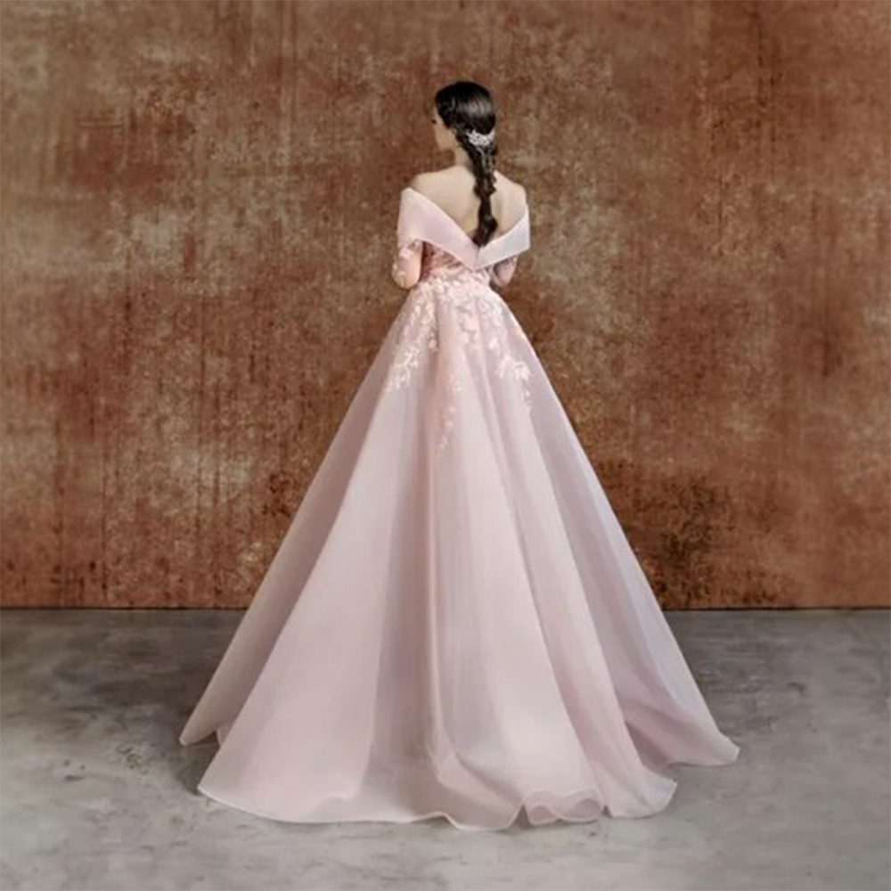 Brique half silk dress with draping on bust and belt fully decorated with beads and embroideries.