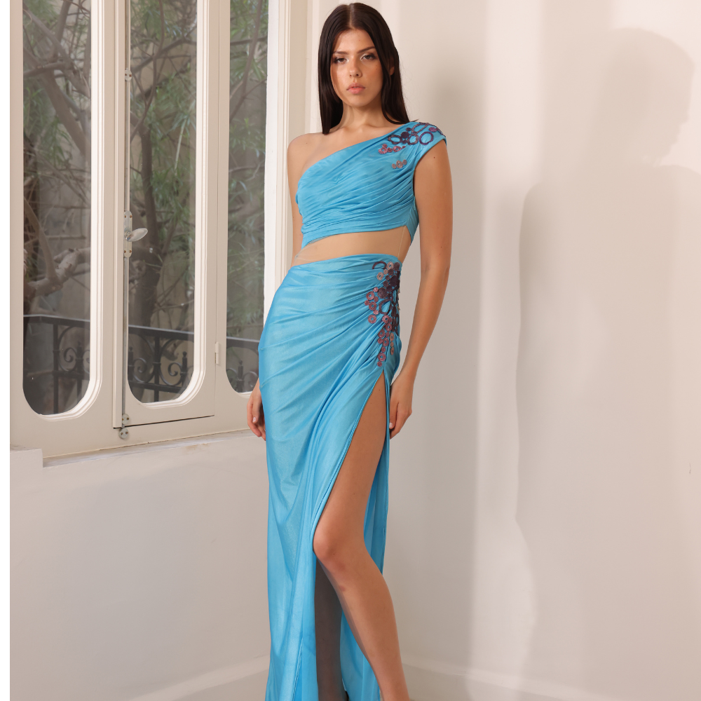 Long silk blue jersey dress with multicolor guipure details