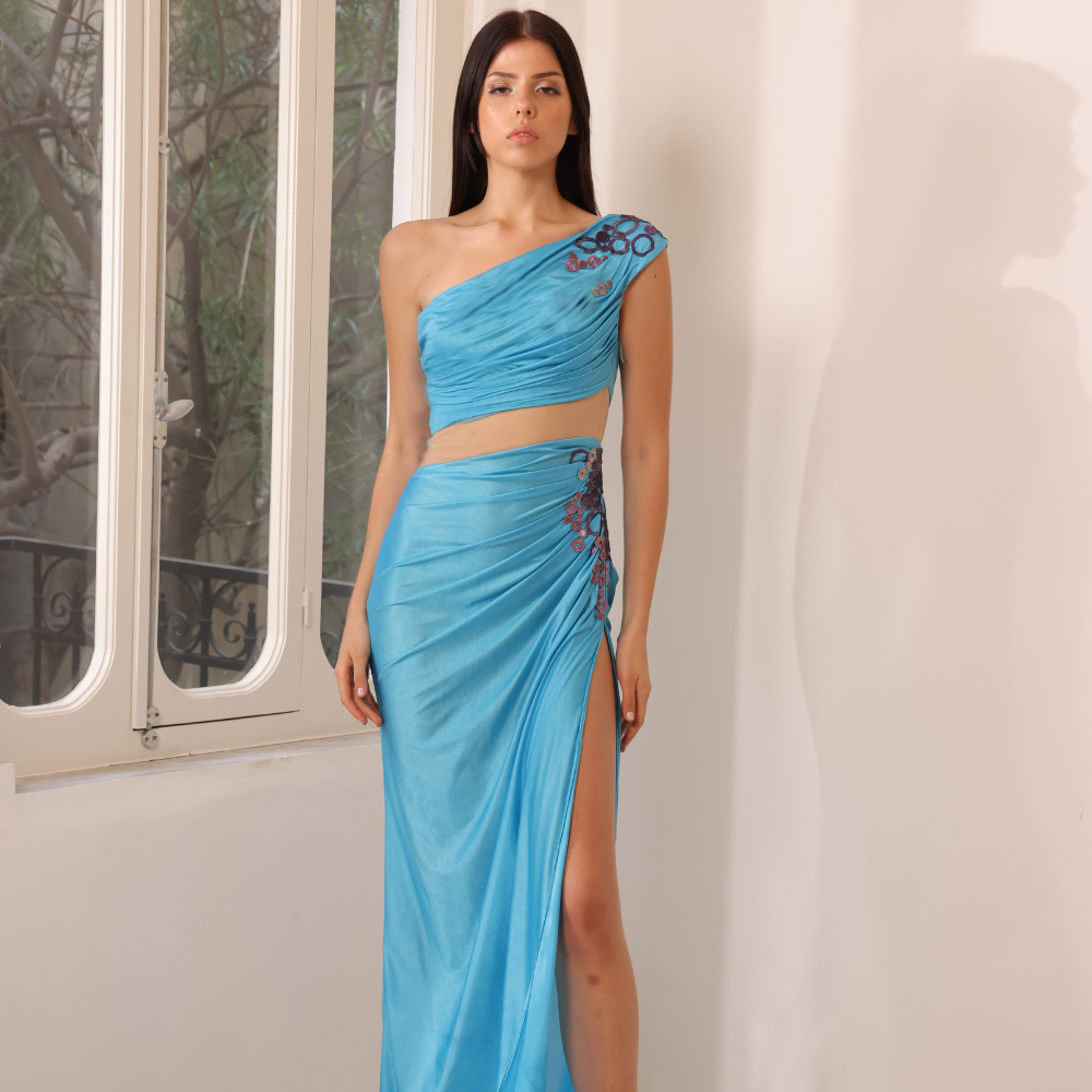 Long silk blue jersey dress with multicolor guipure details