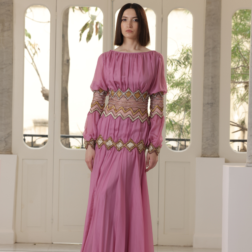 Long violet pink dress with sleeves in silver and gold embroidery