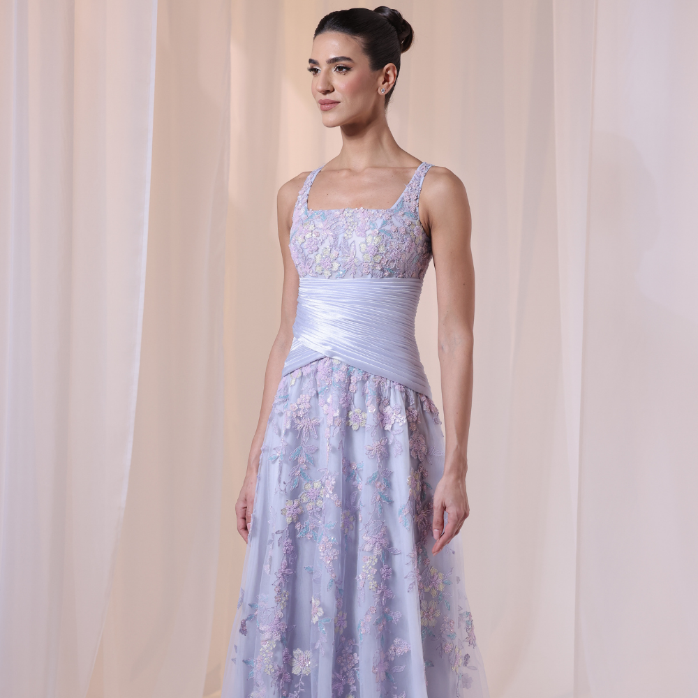 Shop online soft lavender gown with delicate floral embroidery and flowing layered silhouette, perfect for parties, receptions and special occasions.