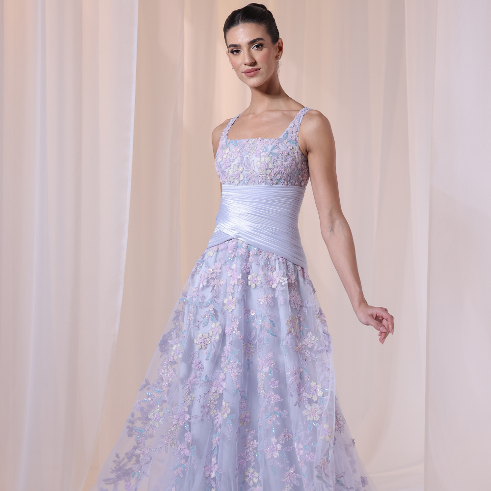 Shop online soft lavender gown with delicate floral embroidery and flowing layered silhouette, perfect for parties, receptions and special occasions.