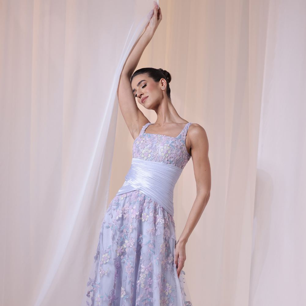 Shop online soft lavender gown with delicate floral embroidery and flowing layered silhouette, perfect for parties, receptions and special occasions.