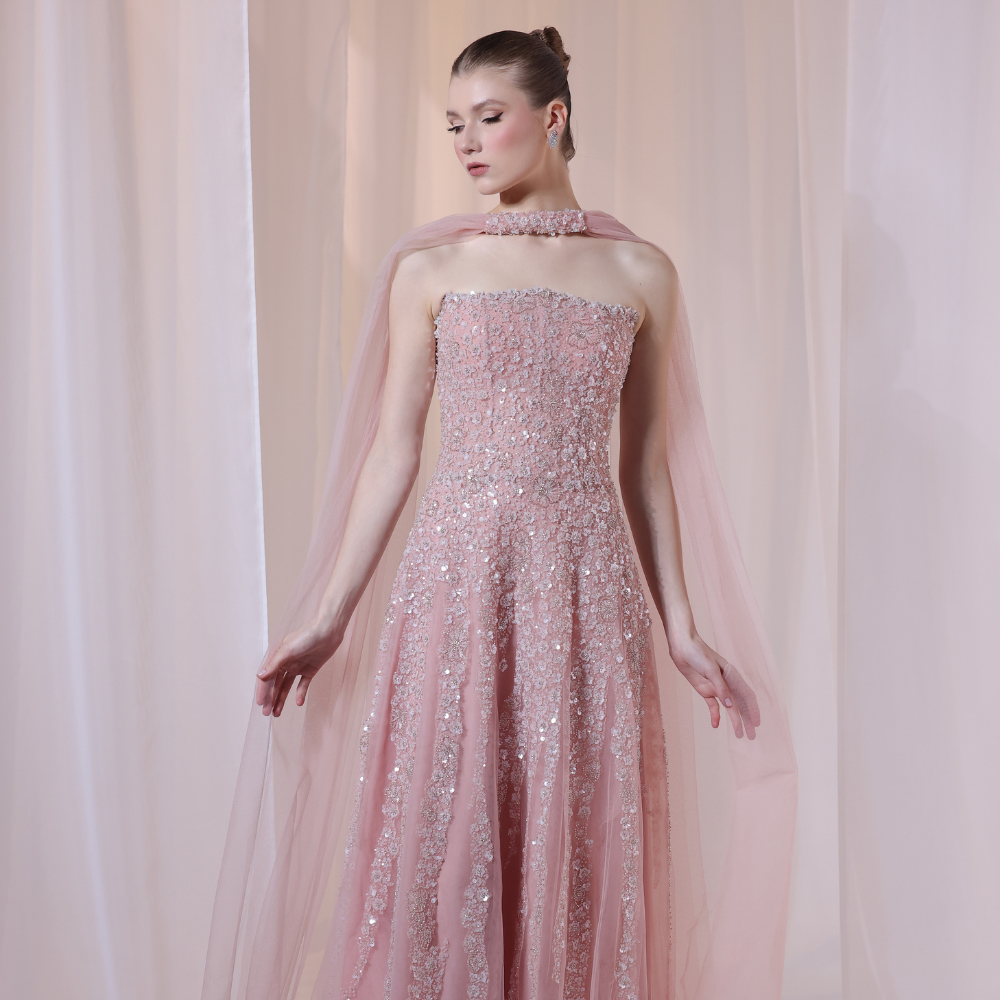 Shop online soft blush gown with delicate shimmer, airy movement and refined elegance, perfect for parties, receptions and special occasions.