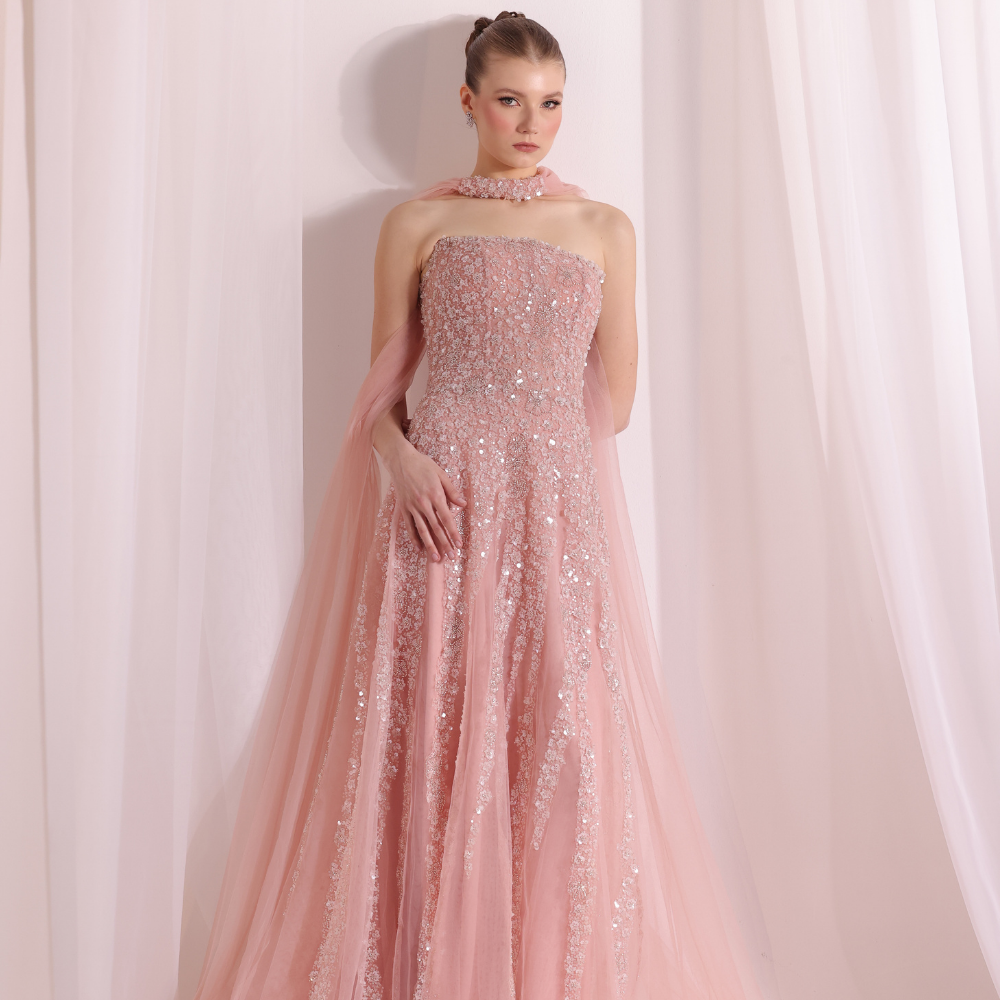Shop online soft blush gown with delicate shimmer, airy movement and refined elegance, perfect for parties, receptions and special occasions.