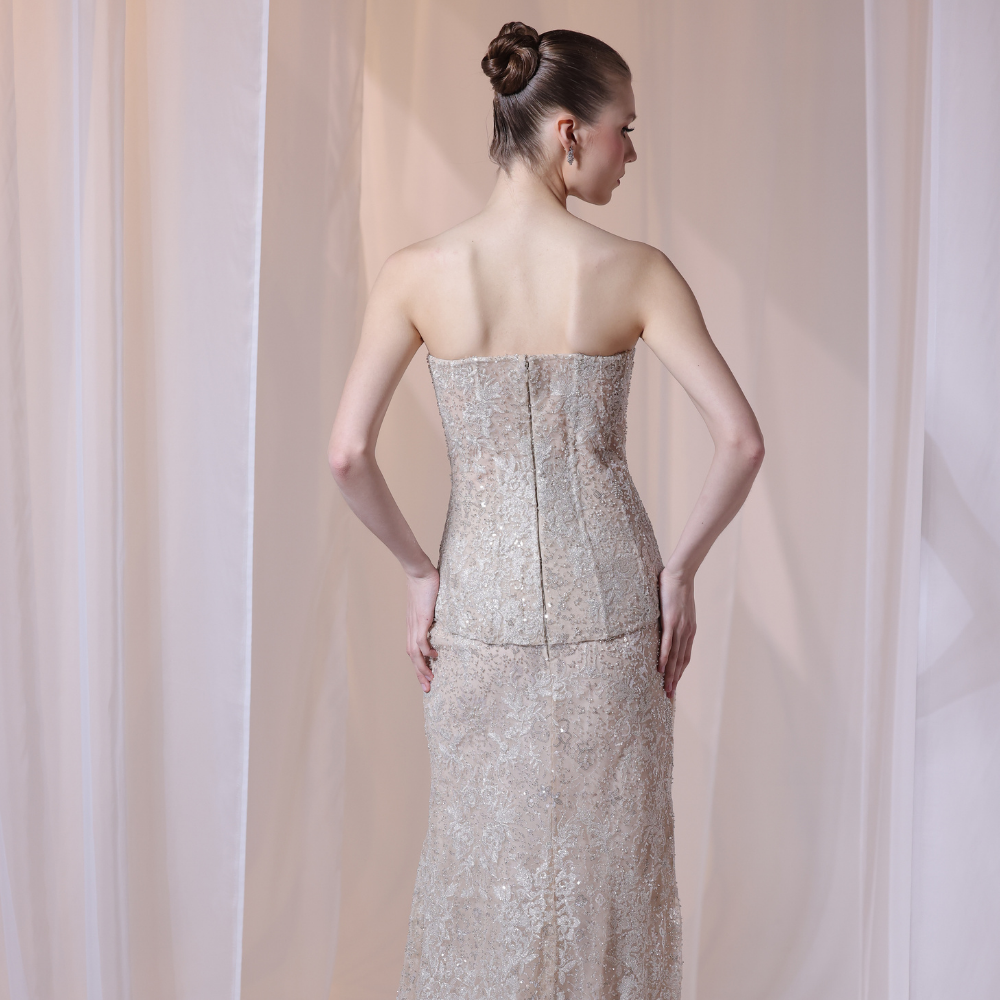 Shop online refined champagne gown with delicate all-over shimmer and sleek fitted silhouette, perfect for parties, receptions and special occasions.