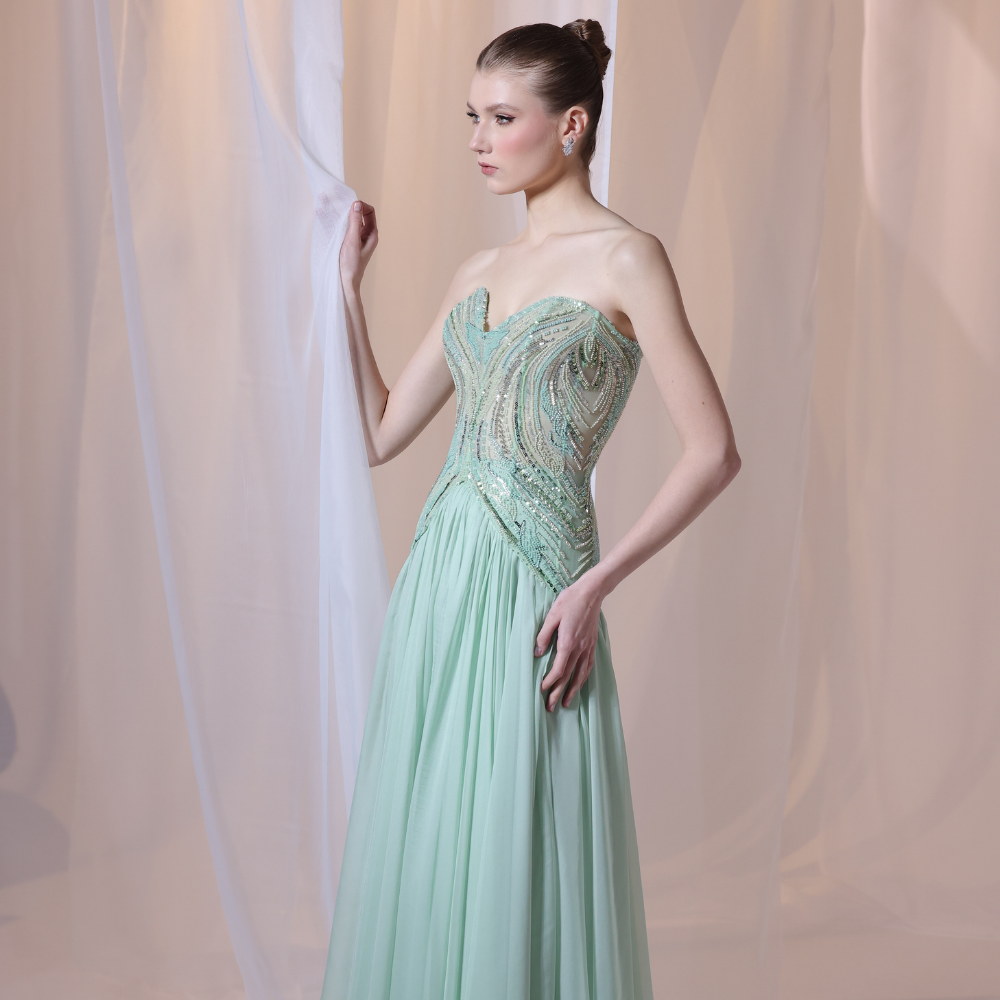 Shop online elegant mint gown with intricately beaded bodice and flowing airy layers, perfect for parties, receptions and special occasions.