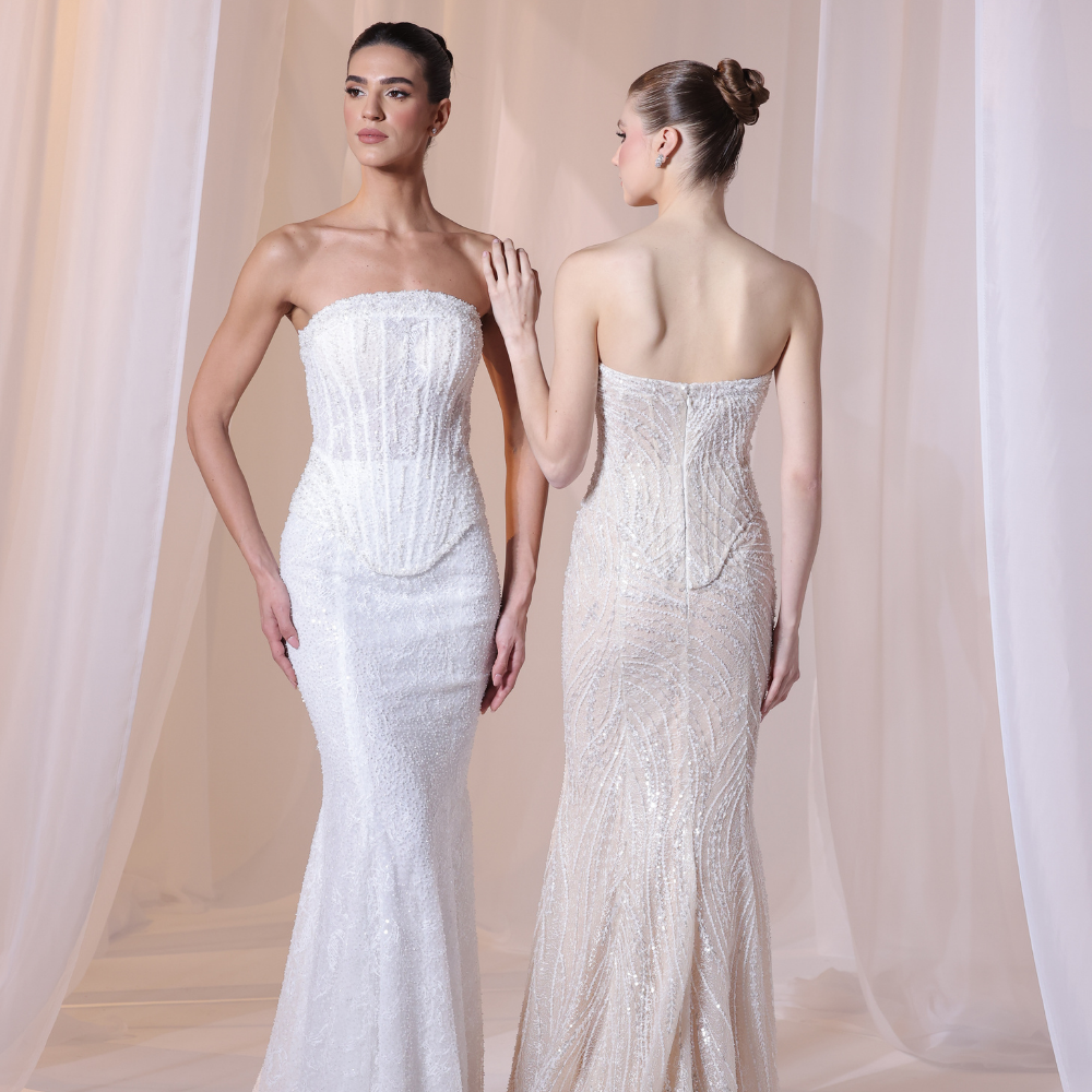 Shop online champagne strapless gown with delicate shimmering embellishments and sleek fitted silhouette, perfect for parties, receptions and special occasions.