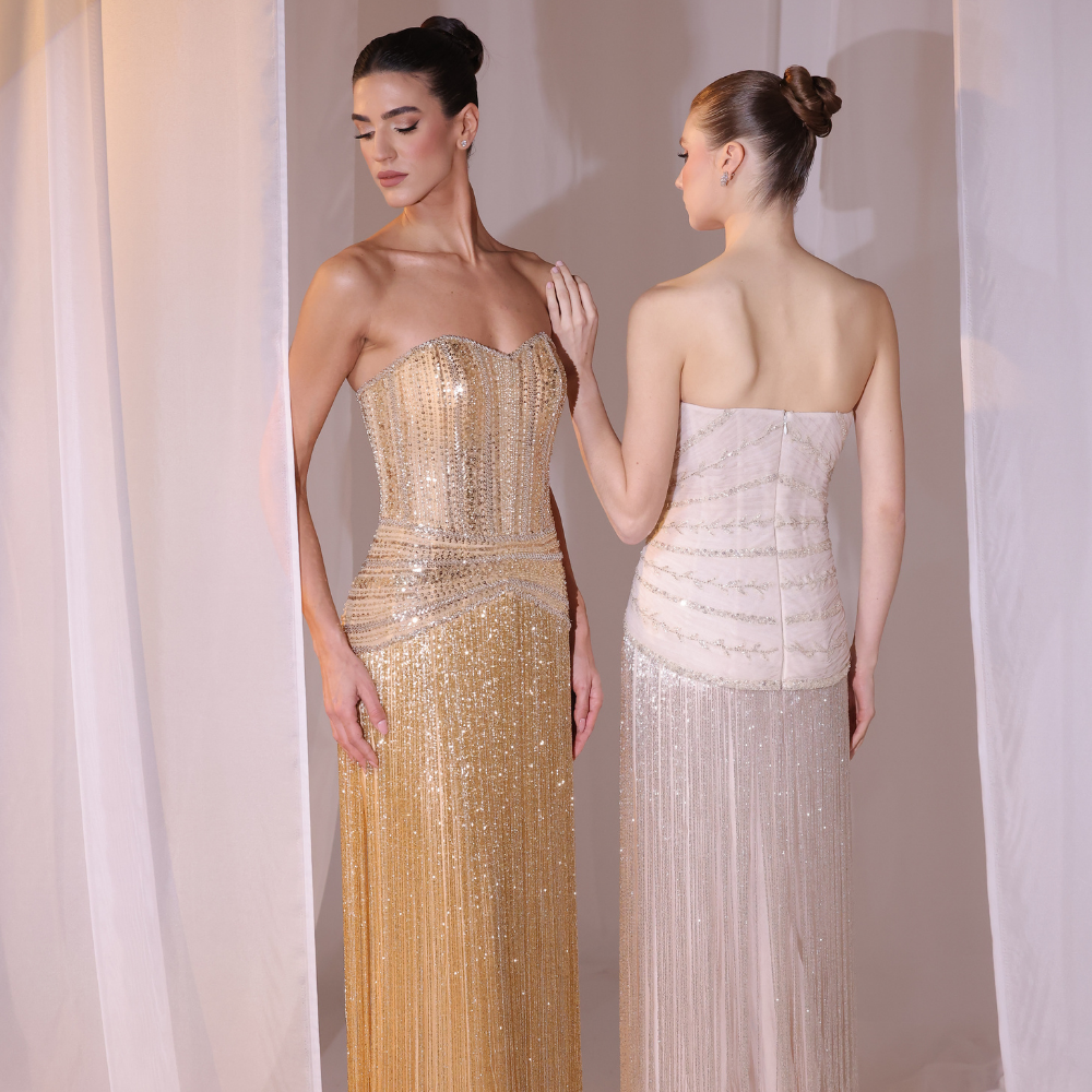 Shop online golden Charleston-inspired gown with fully embellished bodice and shimmering fringe detailing, perfect for parties and special occasions.
