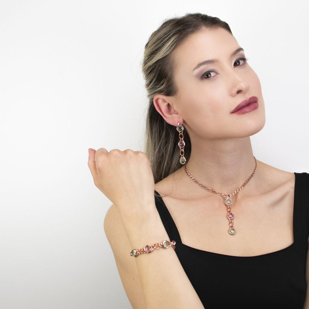 Rose gold plated bronze bracelet with alternating green amethyst and antique pink double-tone crystals for a stylish contemporary finish. Shop premium jewelry online.