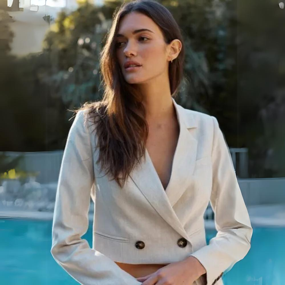 SOFIA IRINA continue to prove her skill with suiting like this blazer. The double-breasted design is made from a cotton linen
