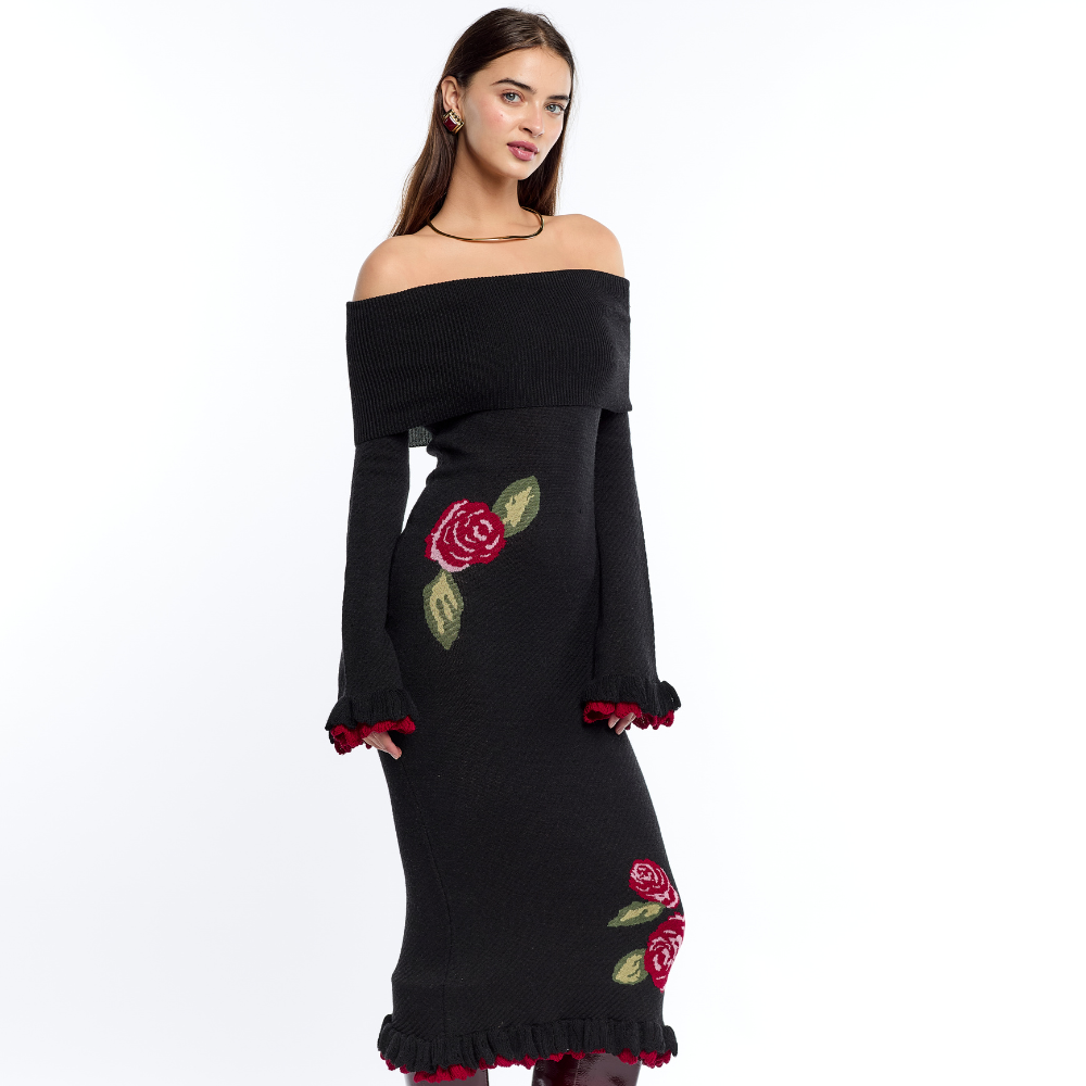 Shop the Mariella Off-Shoulder Dress at TLM, featuring romantic ruffles and a relaxed feminine silhouette. Explore luxury fashion on The Luxe Maison website.