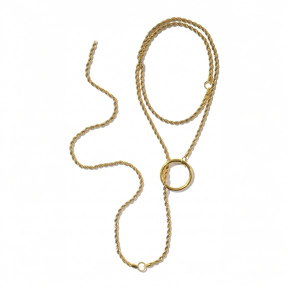 Long chain necklace with oversized ring.