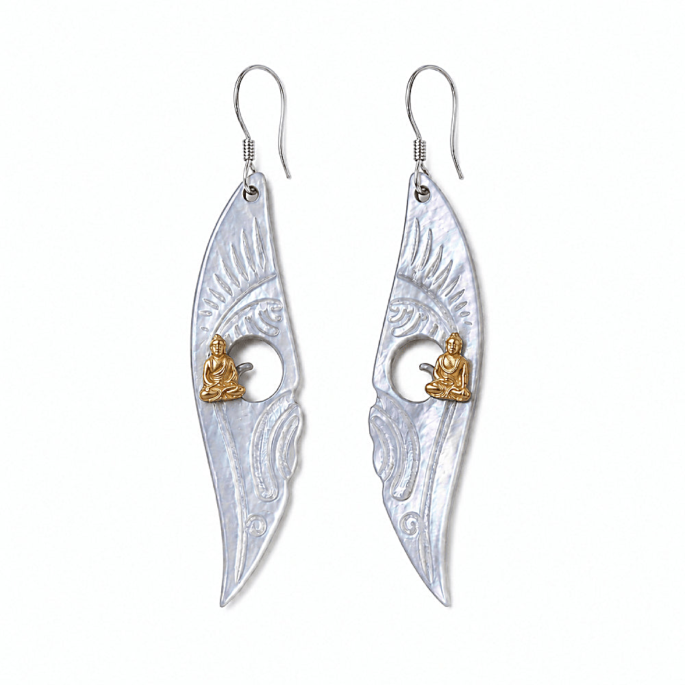 Discover the Meditating Buddha Mother-of-Pearl Earrings at The Luxe Maison, featuring shimmering black mother-of-pearl, an iridescent silver-blue finish, and a delicate golden Buddha accent. Inspired by mindfulness and inner peace, these elegant earrings bring a meaningful, serene touch to everyday style and special occasions.