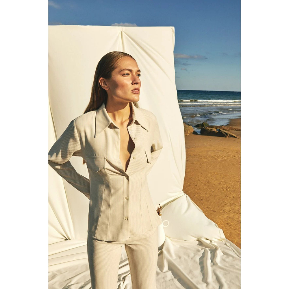 Elevate your look with the Mena Cuff Shirt at our online dress shop. Shop Now!