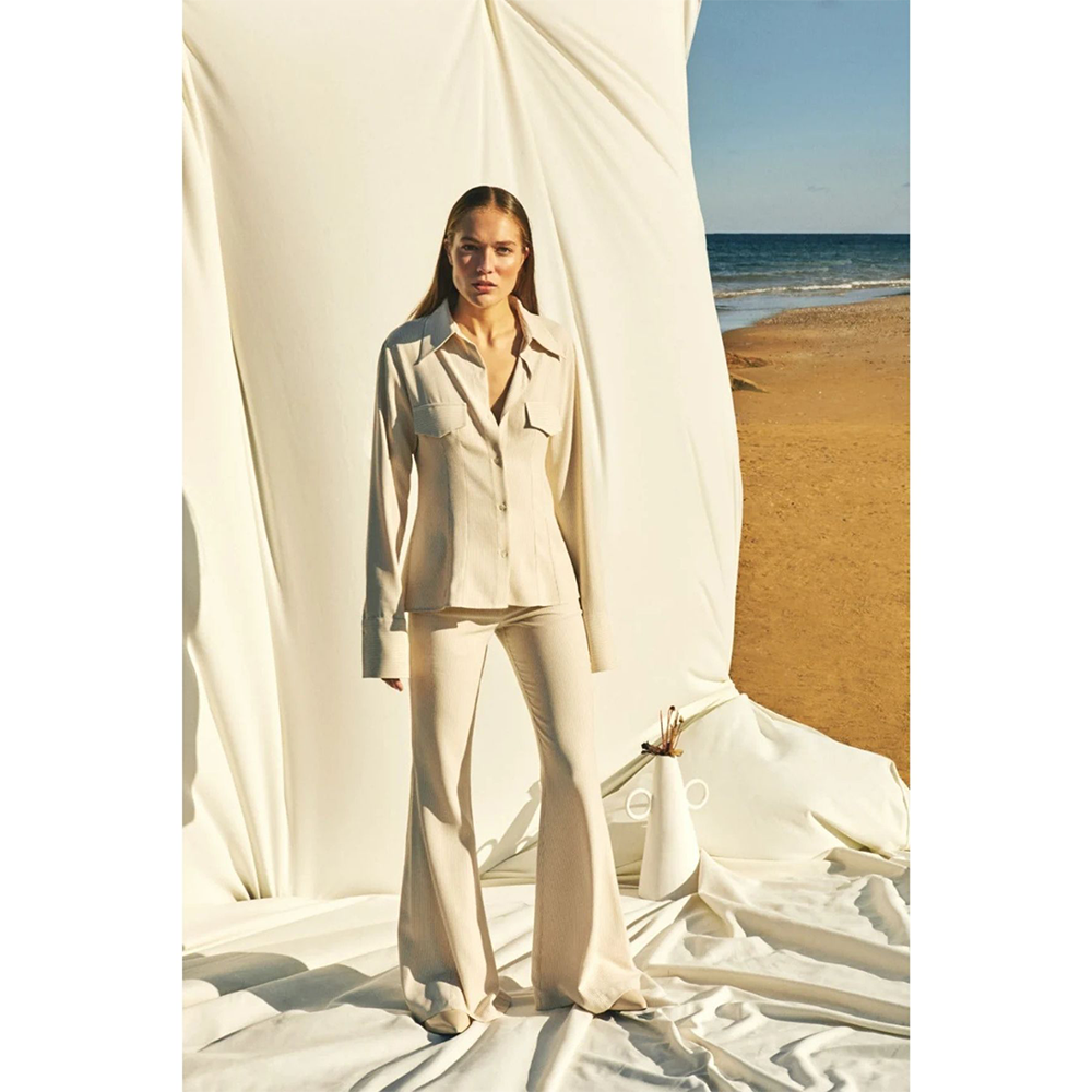 Elevate your look with the Mena Cuff Shirt at our online dress shop. Shop Now!