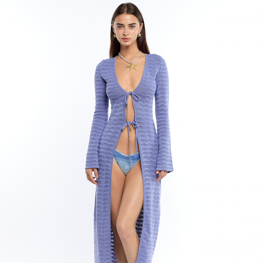 Shop the Mey Blue Crochet Cover-Up at TLM, featuring long sleeves, open-weave texture and scalloped edges. Explore luxury resortwear on The Luxe Maison website.