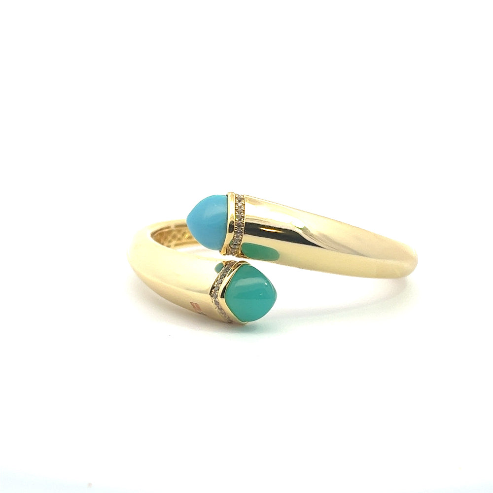 Elegant yellow gold plated cuff bracelet with colored pyramidal crystals and sparkling pavé cubic zirconia accents. Perfect for luxe everyday styling. Shop premium jewelry online.