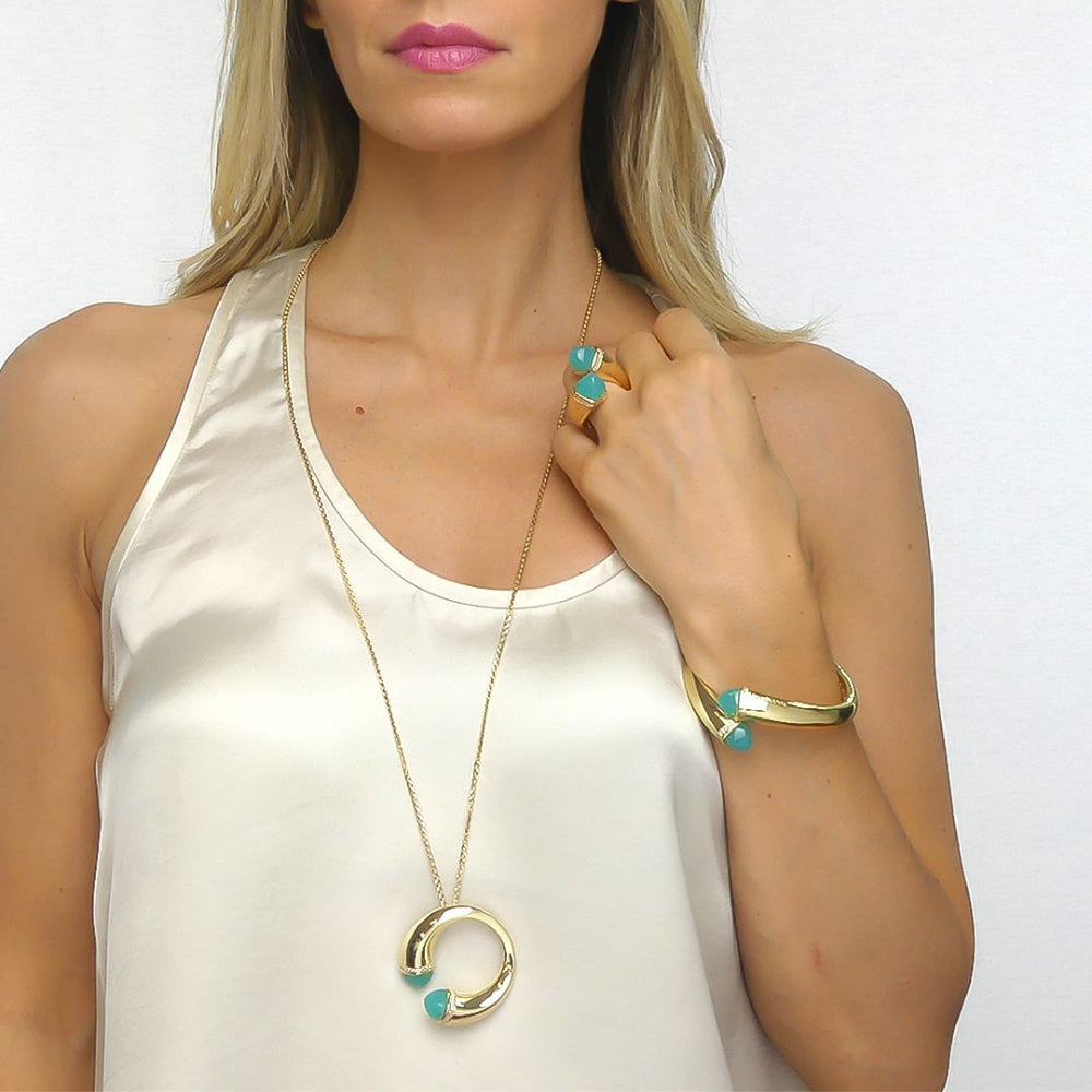 Shop online premium gold circle pendant necklace with colored crystals and sparkling cubic zirconia stones.