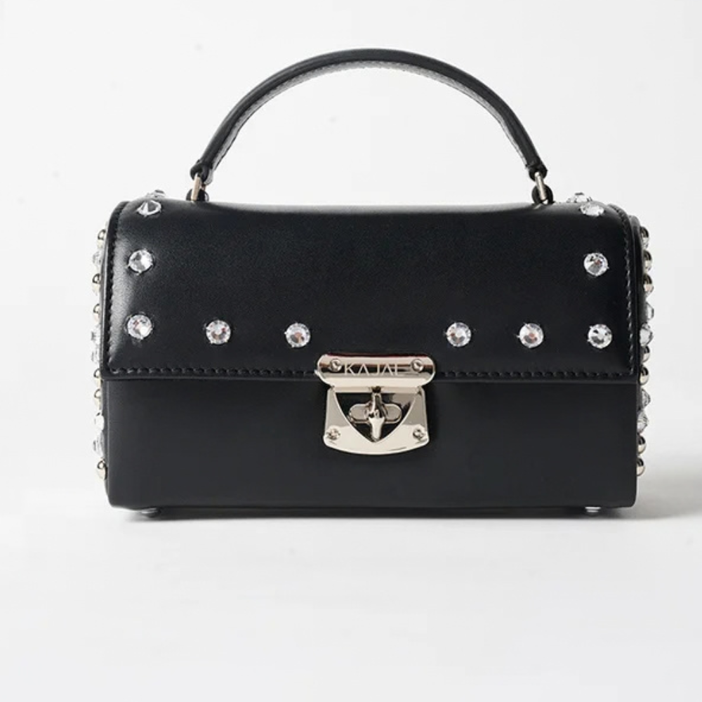 Shop online from our exclusive website. Discover the Mini Trove Bag, a versatile 4-in-1 design that can be styled as a crossbody, shoulder bag, belt bag, or clutch.