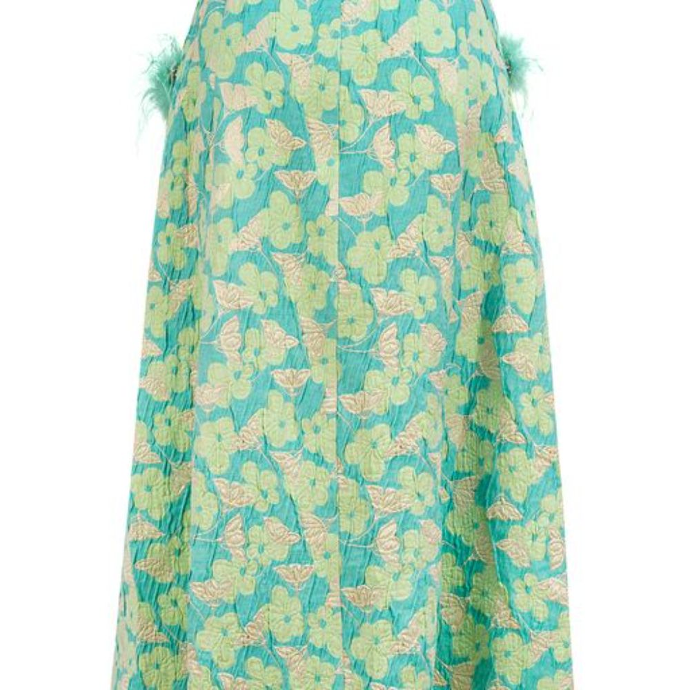 Mint Skirt With Feather Details is cut from a lightweight cotton with a hint of stretch.
