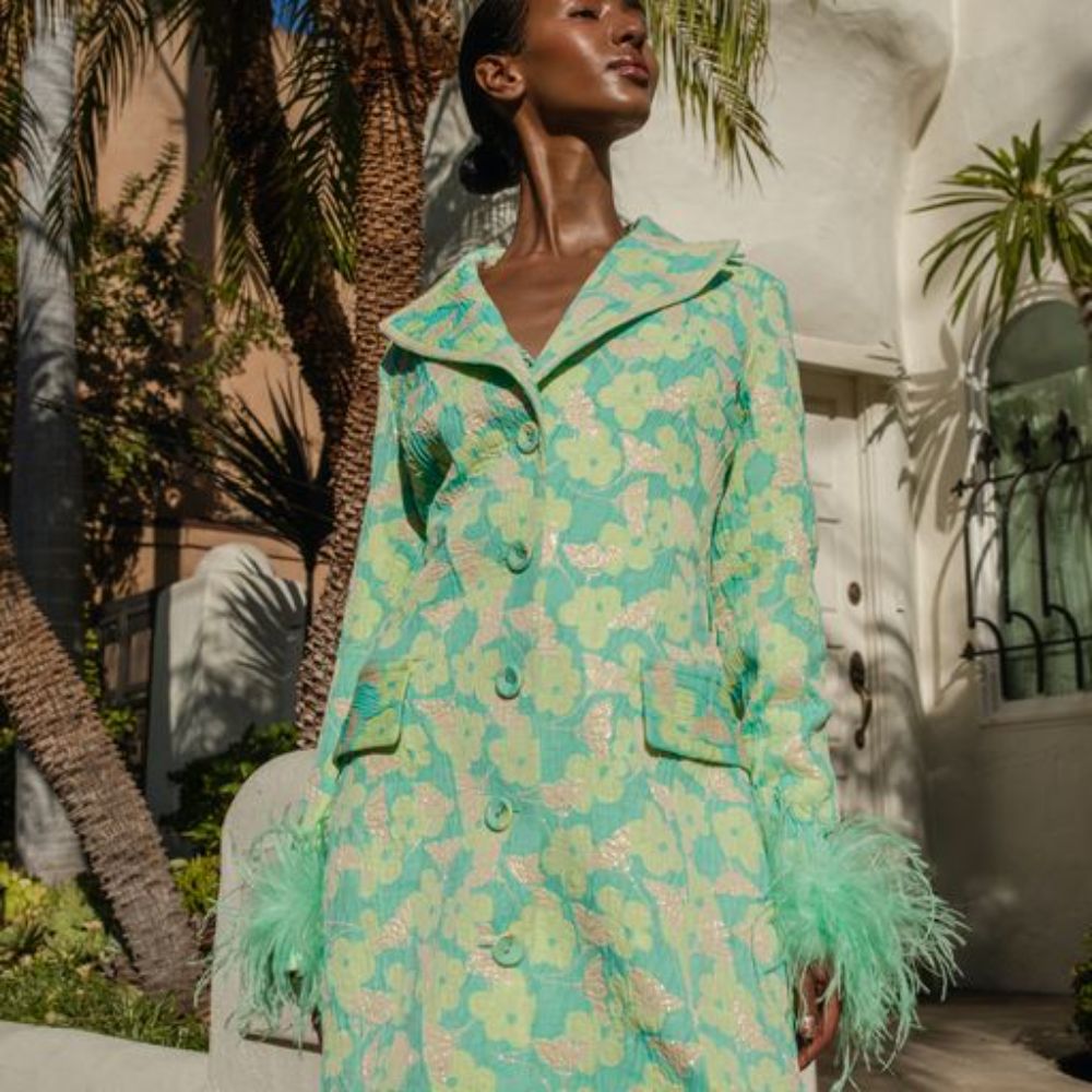Signature Mint Jacqueline Jacket With Detachable Feather Cuffs has printed fabric with an epaulette details.