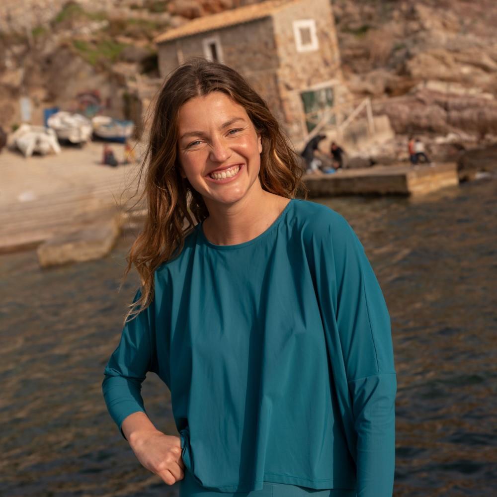 Mykonos UV Top designer top made for refined beauty. Shop Now!