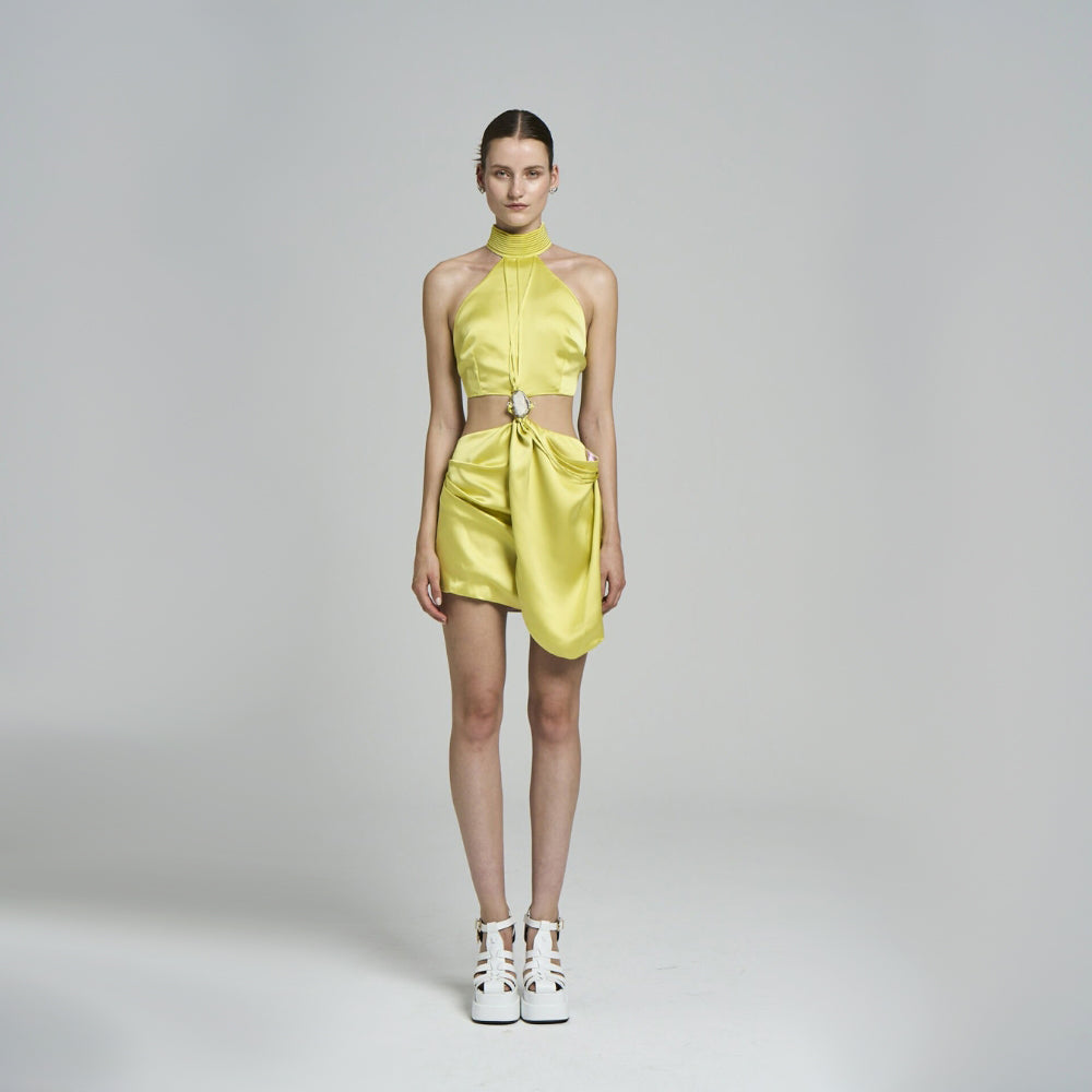 Evening mini dress. .Natural stone detail .Handwork Detailed .Wrap closure .Sleeveless .Draped .Cut-out detail .Satin fabric .Halter collar