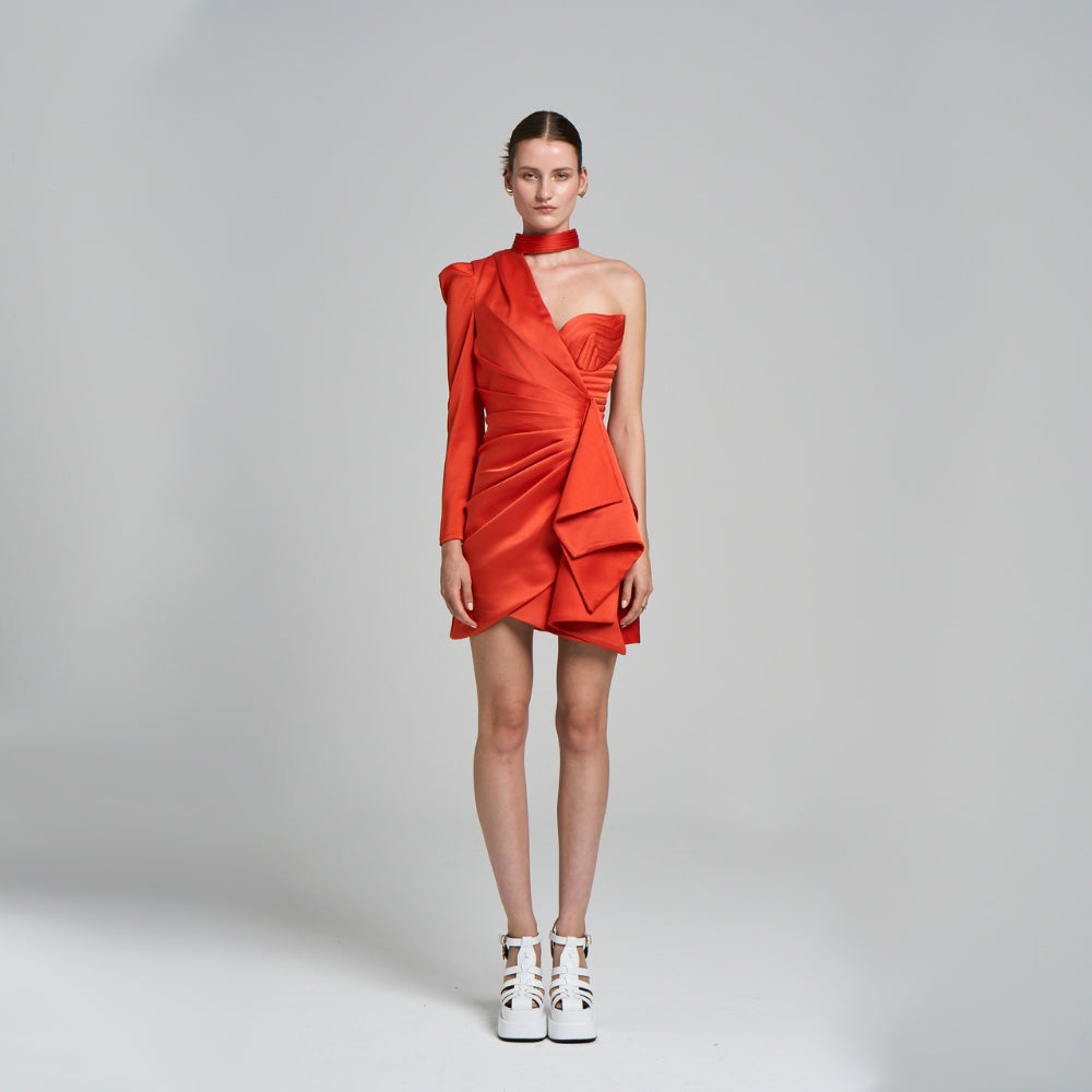 Double-breasted closure detail. Asymmetrical pattern .Mini evening engagement dress