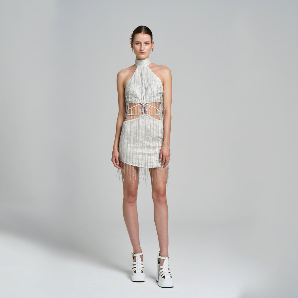 Embroidered fabric .Fringe detail .Hand embroidered .Halter collar .With button closure.Mini evening dress