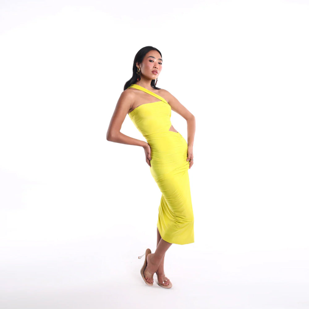 Chartreuse one shoulder dress with cut out and slit, perfect for parties. Shop online from our curated edit of premium fashion.