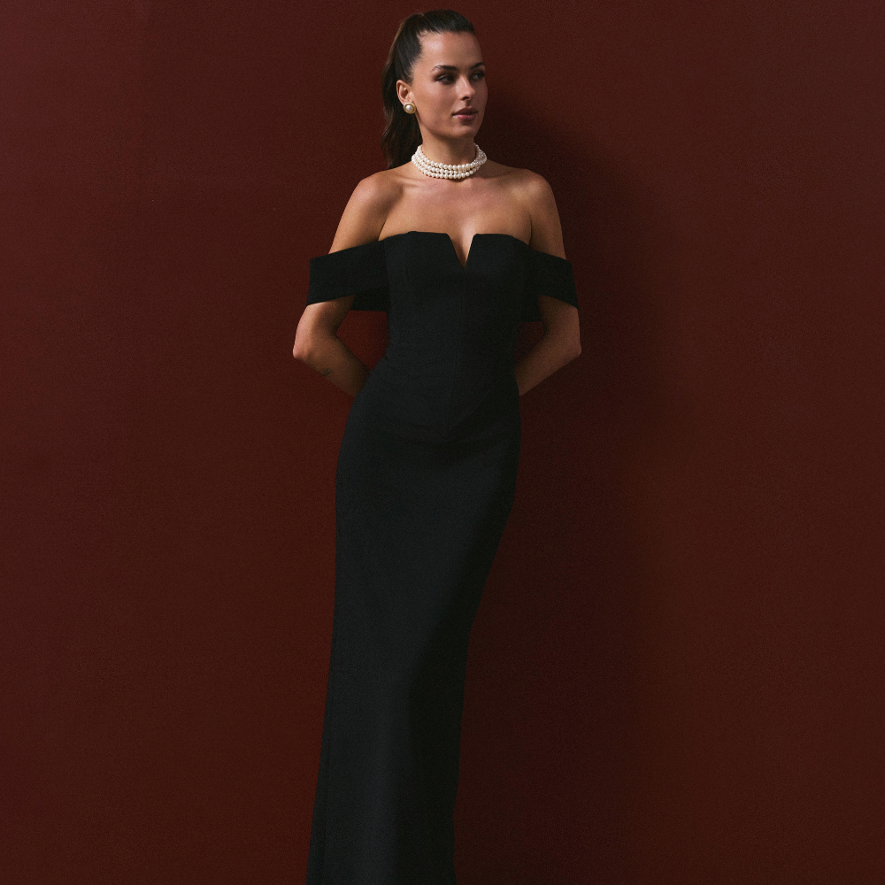 Elegant full-length corset dress featuring a stylish shoulder accent for a bold, refined look. Shop now at our exclusive clothing website.