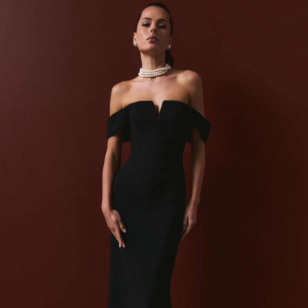 Elegant full-length corset dress featuring a stylish shoulder accent for a bold, refined look. Shop now at our exclusive clothing website.