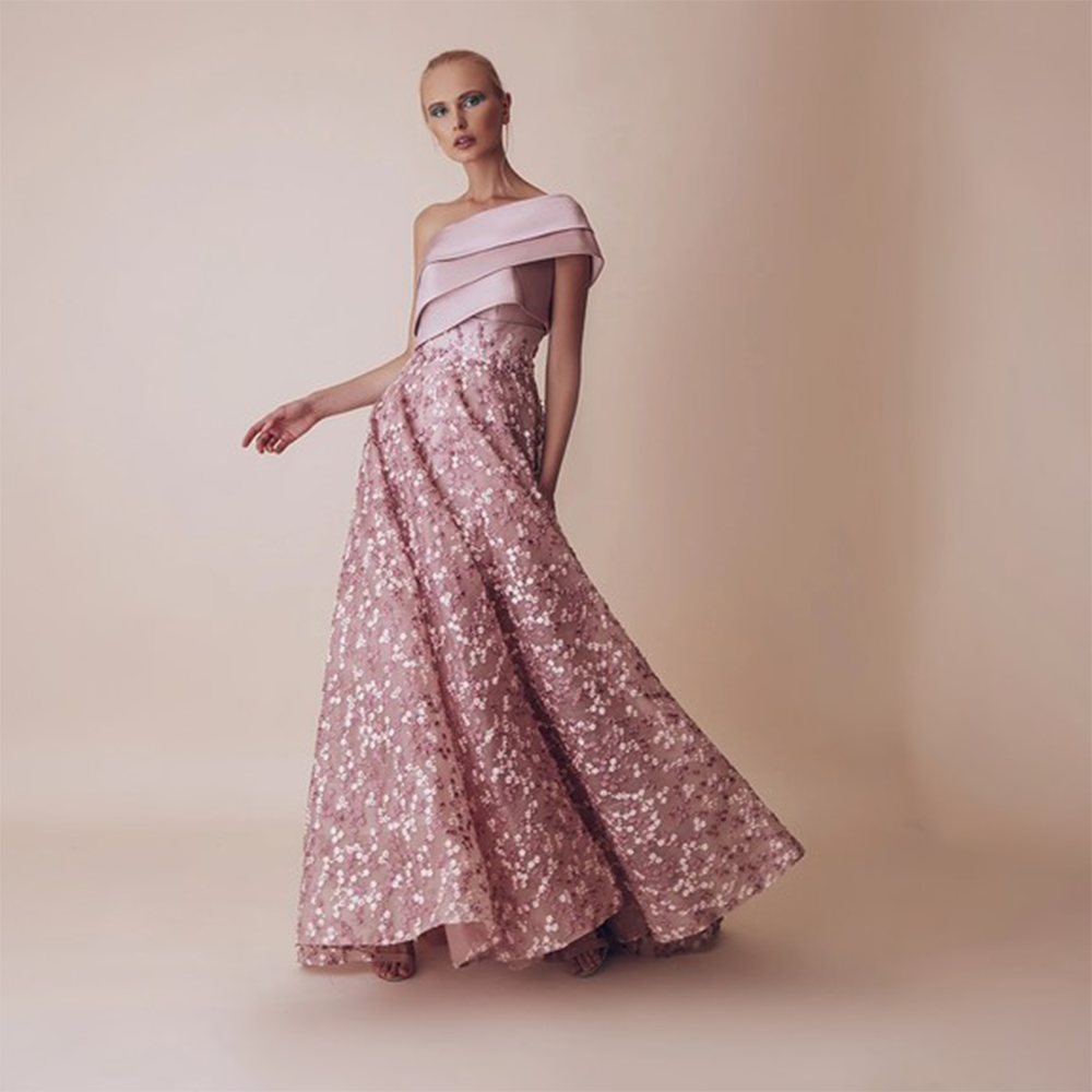 One side off shoulder bodice connected with fully embroidered flared lower bodice.