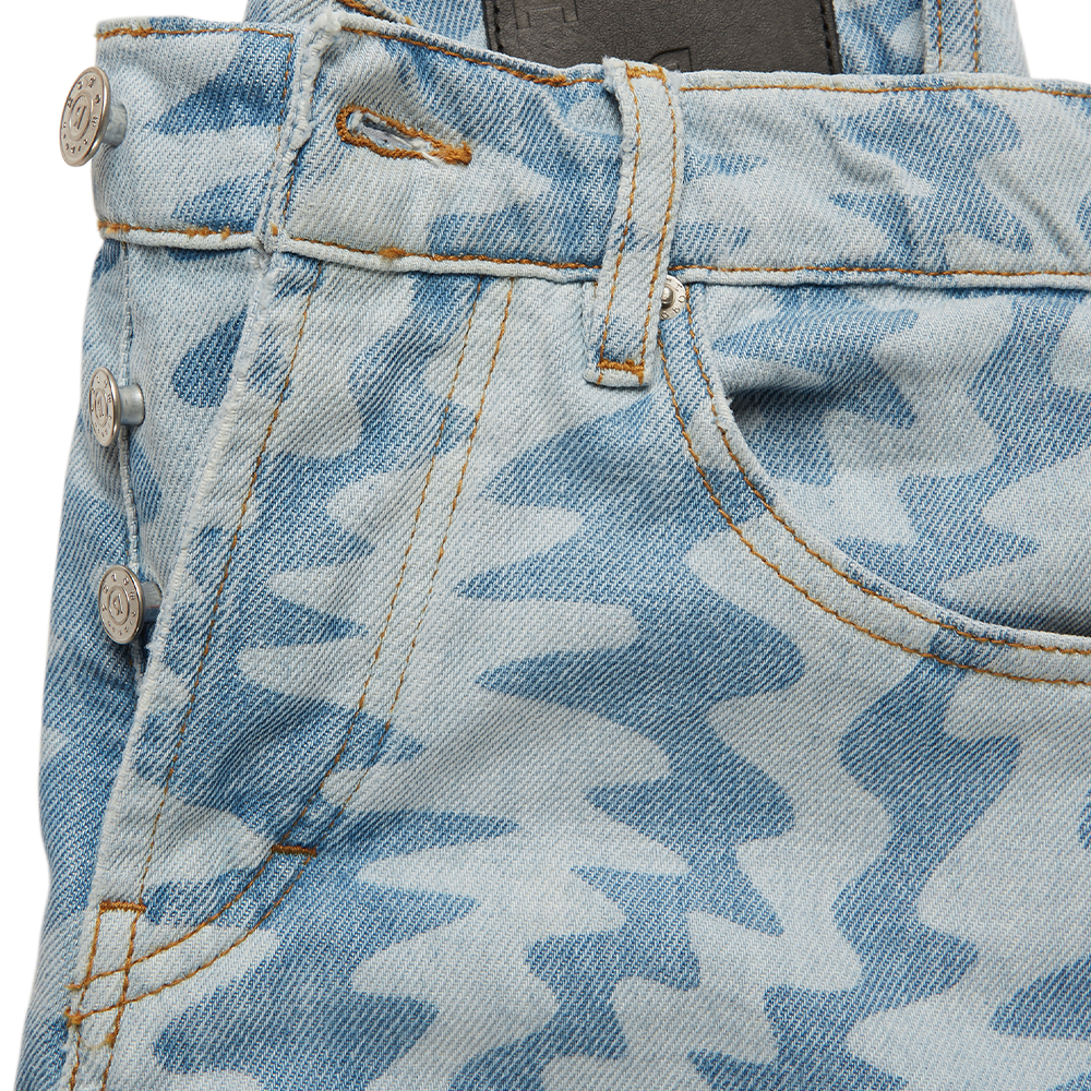 Oren light blue men's jeans are patterned with a contrast motif print. They’re crafted from rigid denim with a straight leg
