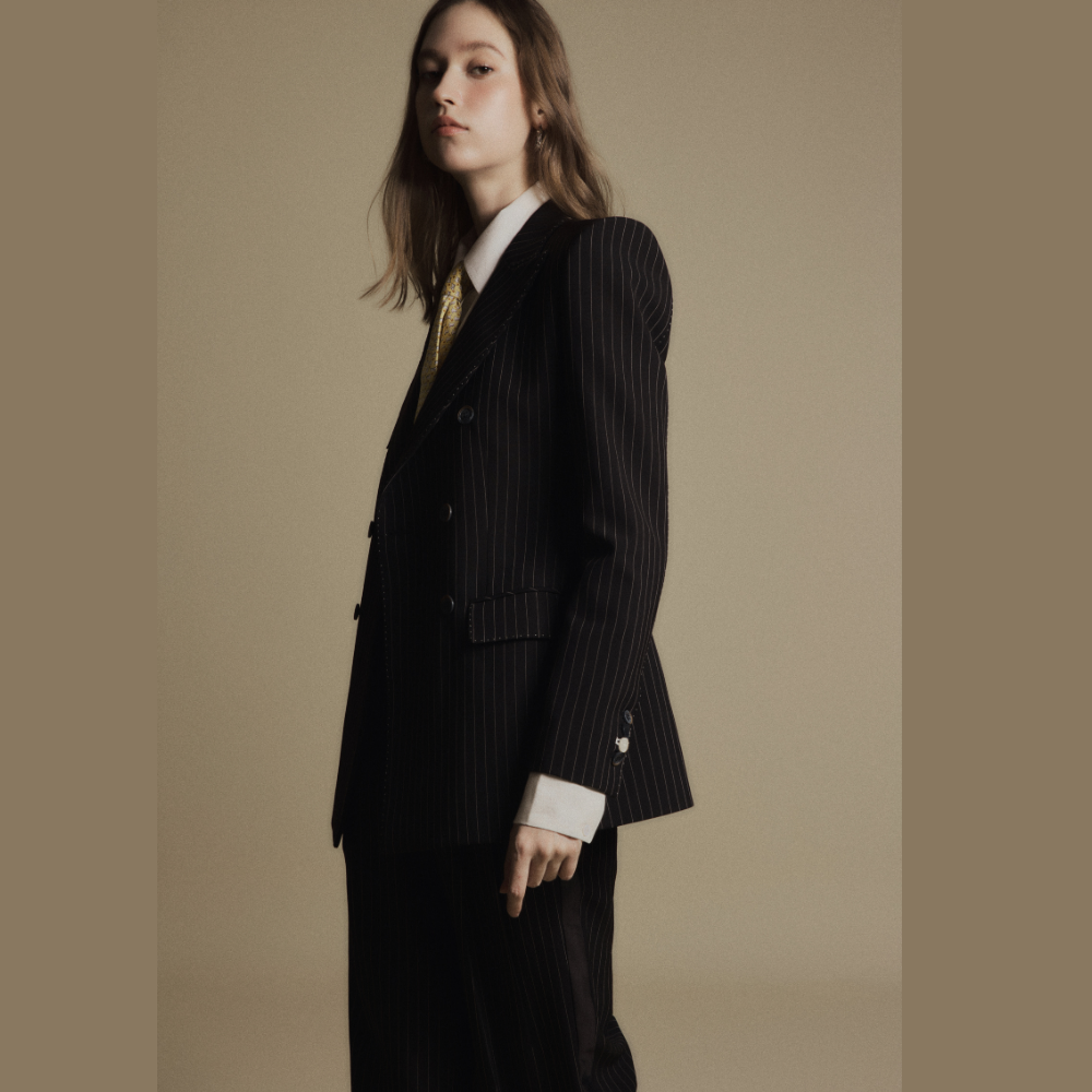 Discover elegant ladies wear featuring the sophisticated Obsidian Pinstripe Pants for any occasion. Shop Now!