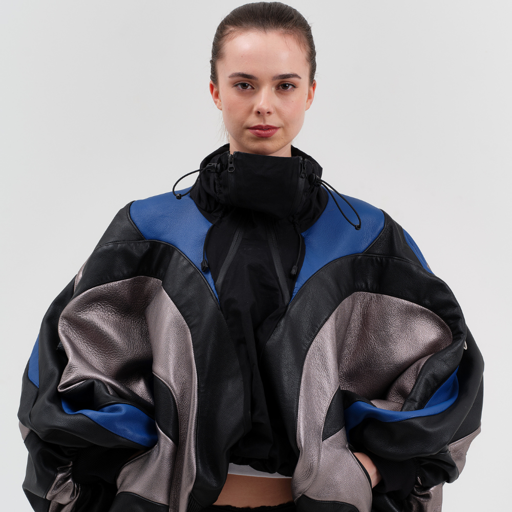 Shop online from our exclusive website. Discover the VOITECH® Omega Leather Bomber with premium three-tone leather, aerodynamic panel construction, dual-zip closure, and a sculpted performance-inspired design.