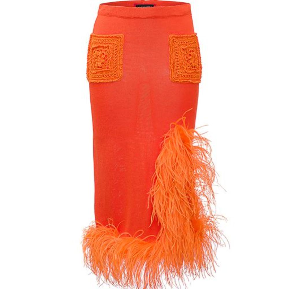 Orange Knit Skirt With Feather Details is cut from a lightweight high quality knit with a hint of stretch. 